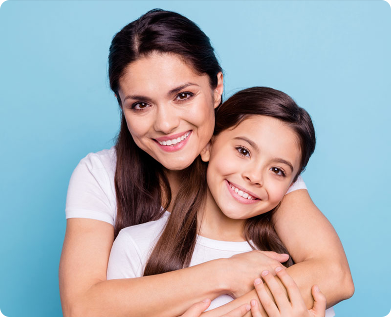 Smiling mother daughter after Studio Dental cleaning Canada